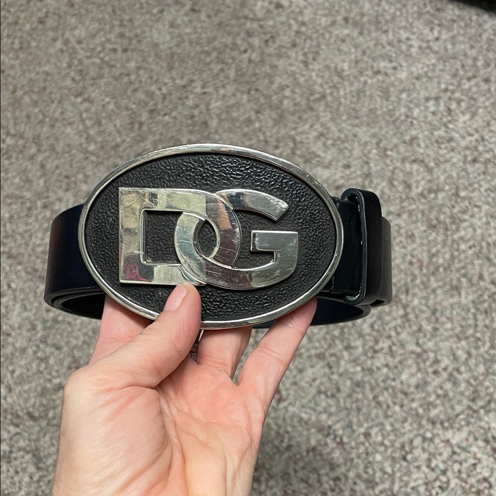 DG silver metal logo buckle on Black leather belt